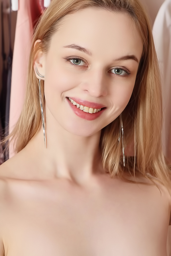 Elfiolla shows perky nipples in thong stripping indoors
