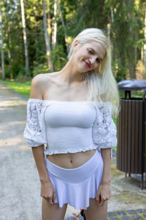 Roni outdoor striptease with curly hair pulling mini skirt legs spread — Roni #5